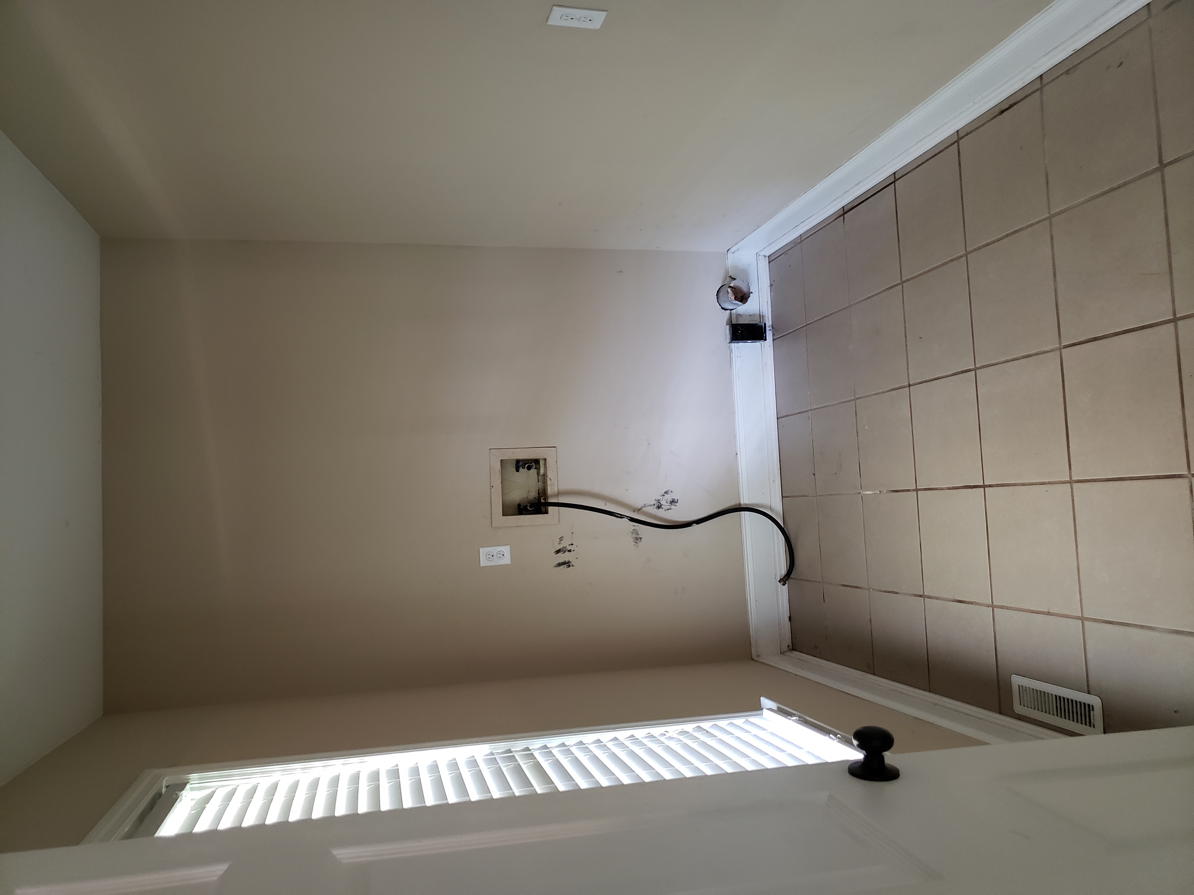 A photo of the house's sidewalk.