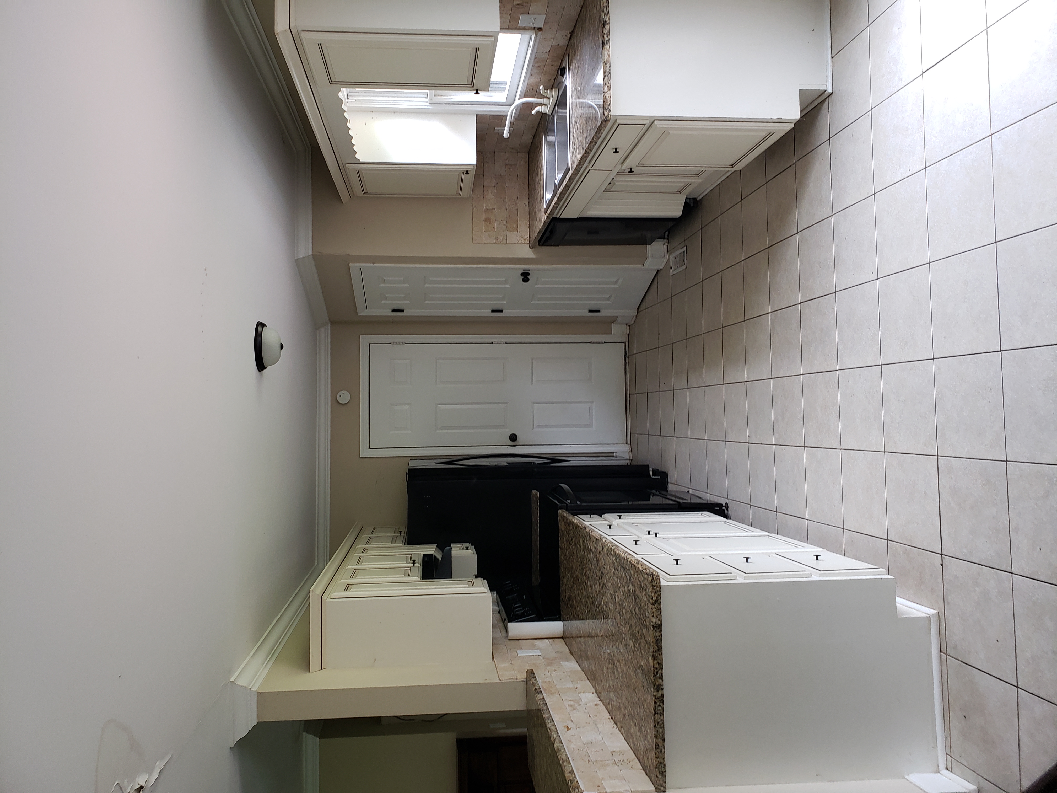 A photo of the house's sidewalk.